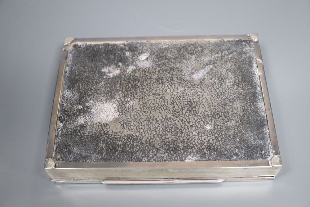 A George V part engine turned silver mounted rectangular cigarette box, William Adams Ltd, Birmingham, 1933, 16.1cm,
